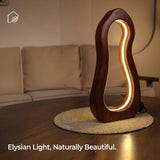 “Elysian Lamp by Ikari Homes – a handcrafted wooden table lamp with a warm boho aesthetic, perfect for cozy corners and minimal interiors.