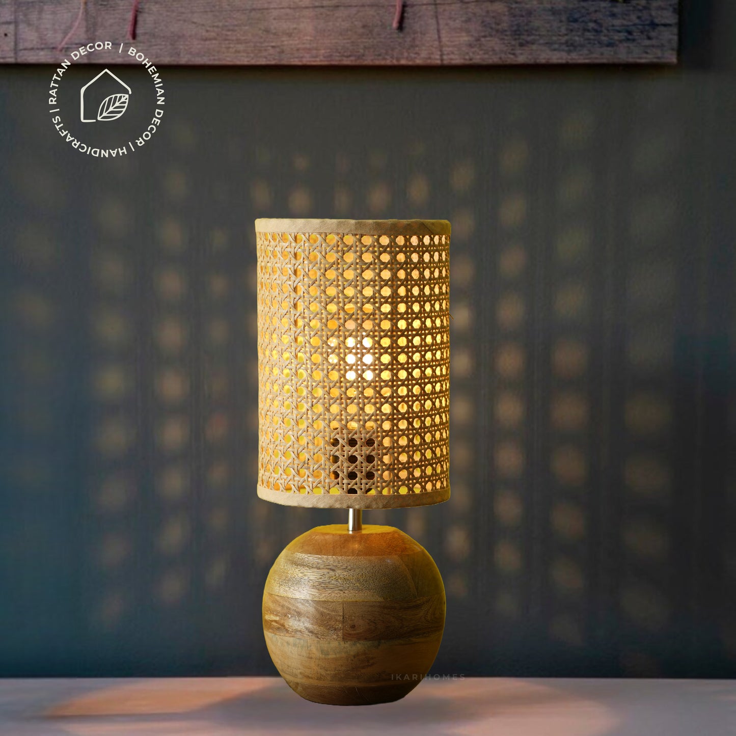 Lumi Rattan table lamp by Ikari Homes with handwoven rattan shade and wooden base for boho interiors