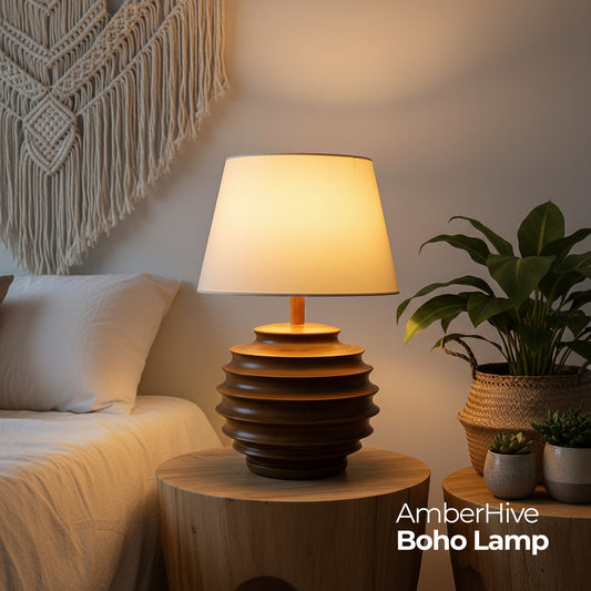 Boho lamp on a table in a living room with 'AmberHive' branding.