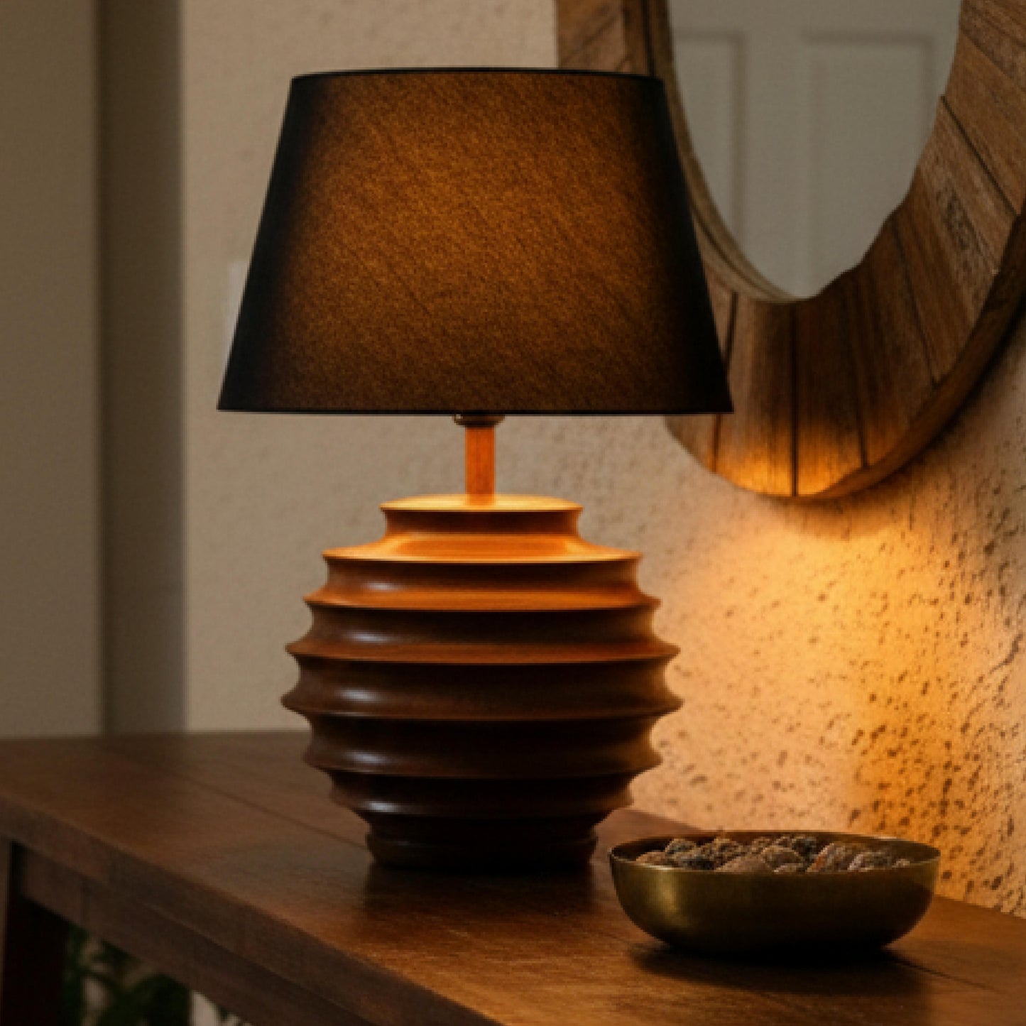 Wooden table lamp with a dark brown shade on a wooden surface.