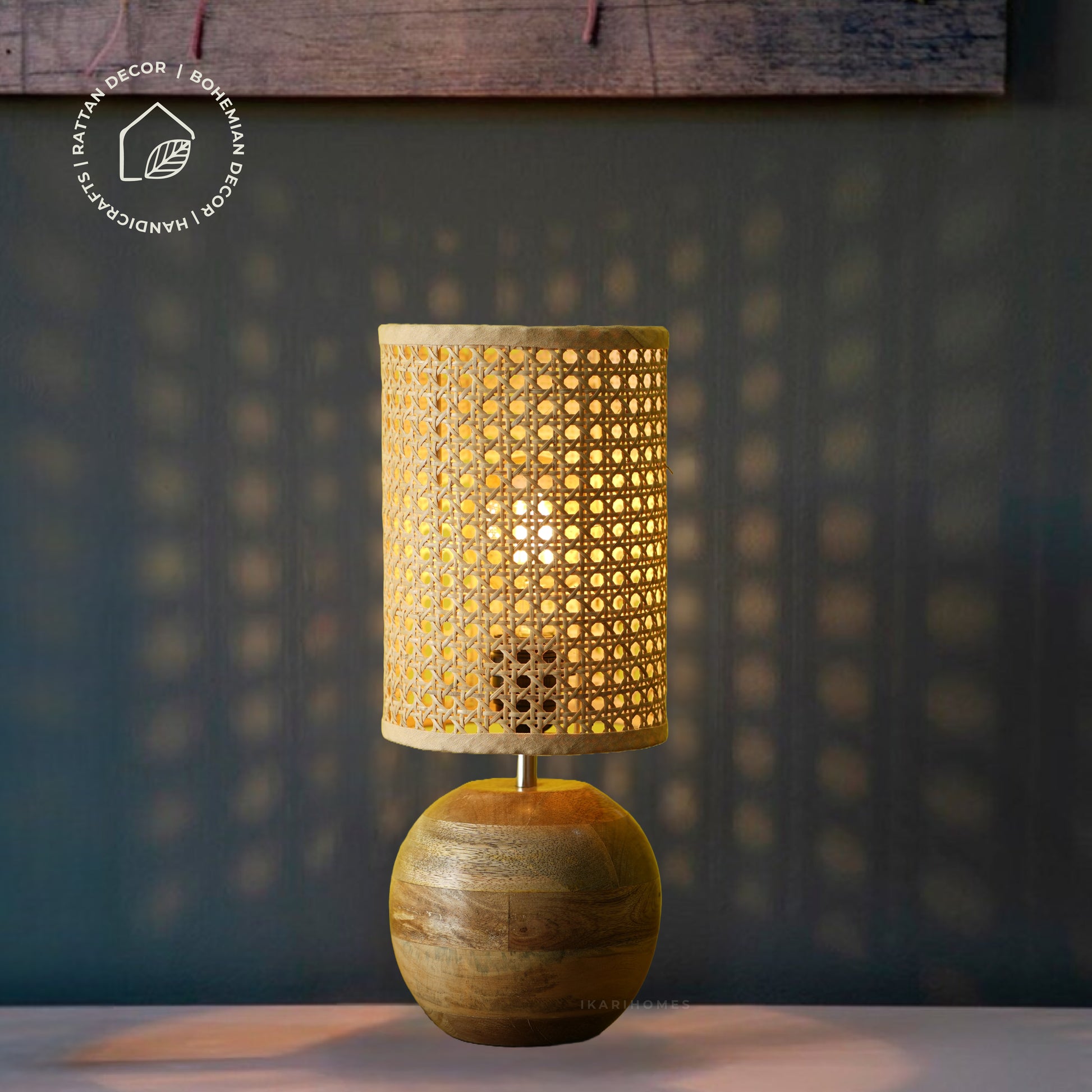 Lumi Rattan table lamp by Ikari Homes with handwoven rattan shade and wooden base for boho interiors